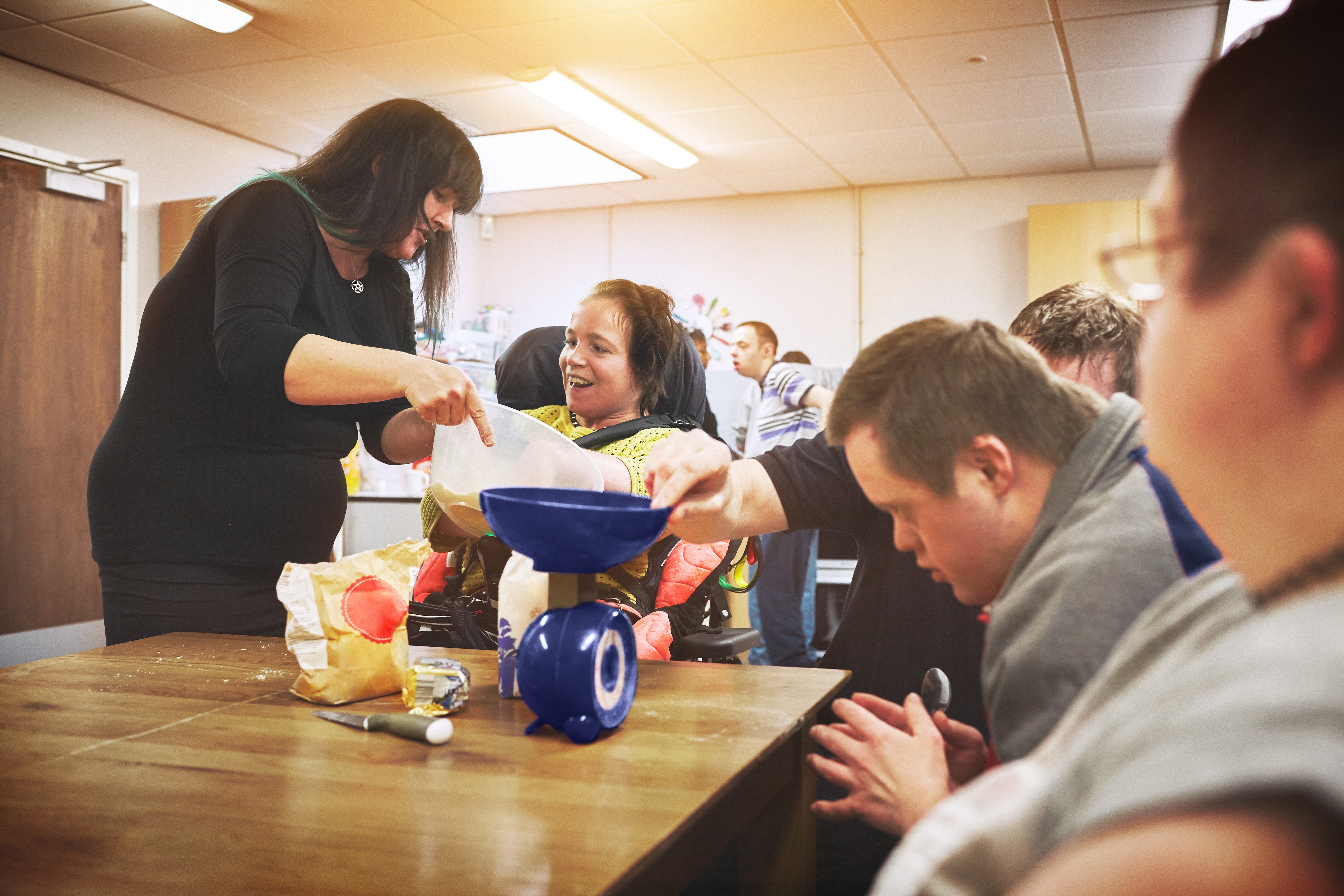 Young people at school cooking